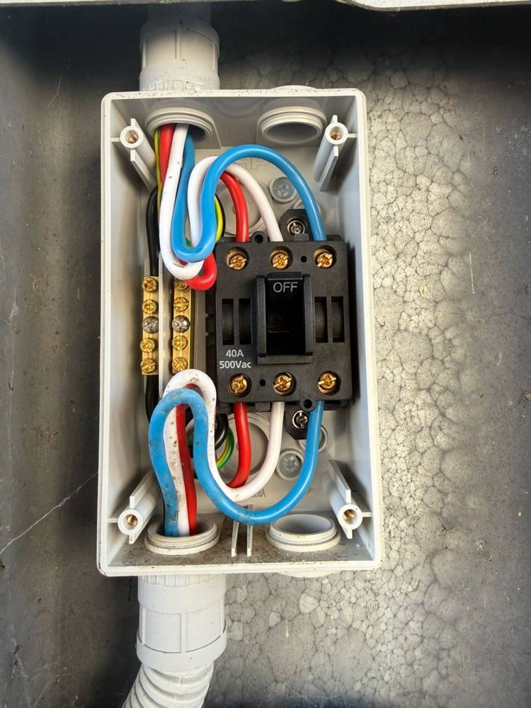 40 amp isolator neatly wired in a weatherproof enclosure